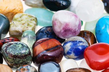 handful of various gem stones close up