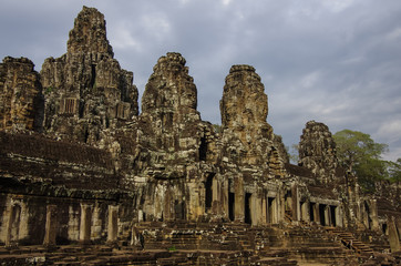 Face stone of ancient Bayon Temple in Angkor Wat, Siem Reap, Cam