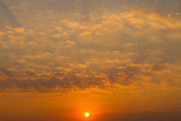 sky with beautiful clouds and rising sun, horizontal