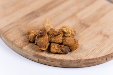 Pile of greaves on the wooden board