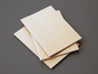 Set of golden color notebooks on the gray background. Horizontal. 3d render