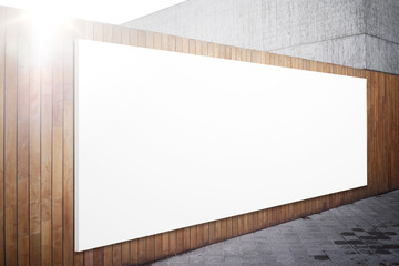 Blank billboard on the wood wall. 