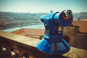 Blue coin operated telescope in Porto.