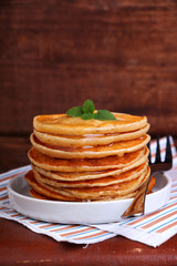 making pancakes on Shrove Tuesday in a white bowl