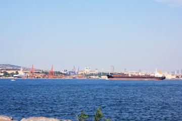 Bosphorus, the cargo ship in the Bosphorus, the clear sky, the bridge over the Bosphorus, Istanbul...