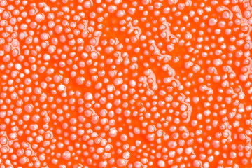 Abstract Colorful background - textured orange wet Plasticine