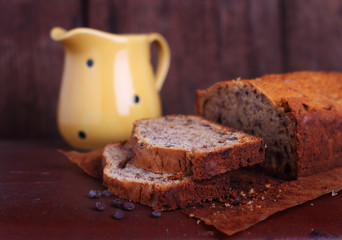 Apple cake with walnuts on a brown background