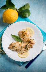 fish fillet with lemon and sage