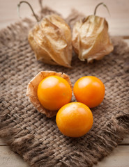 Cape gooseberry on wooden background