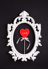 souvenir gift for Valentine's Day red heart with a white ribbon