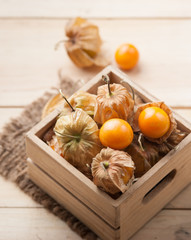 Cape gooseberry on wooden background