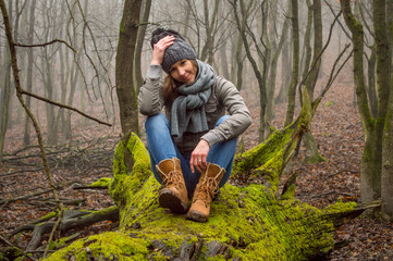 Naklejka na ściany i meble Active healthy woman hiking in beautiful forest. 