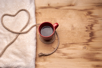 A cup of coffee on the wooden table