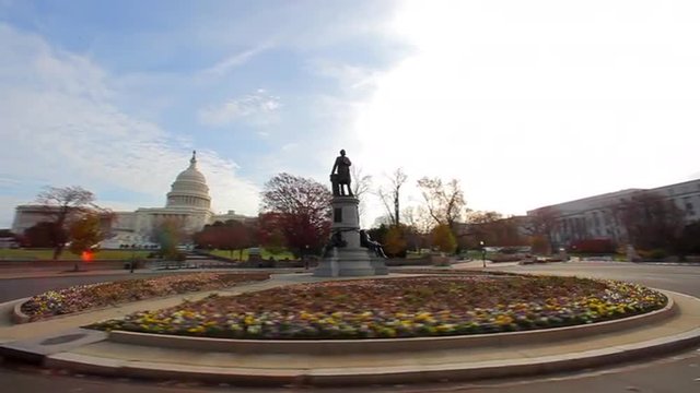 Tracking, circular shot of the James A. Garfield Monument near the United States Capitol.