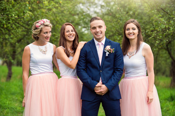 Bridegroom with bridesmaids