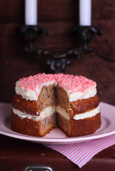 Banana cake with cream in a white dish