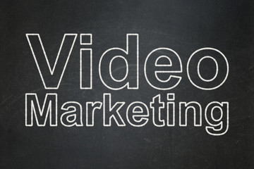 Fototapeta na wymiar Marketing concept: Video Marketing on chalkboard background