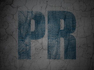 Advertising concept: PR on grunge wall background