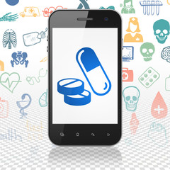 Health concept: Smartphone with Pills on display