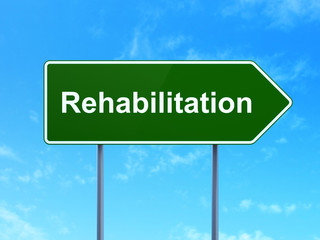 Healthcare concept: Rehabilitation on road sign background