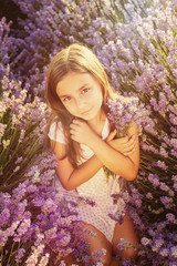 Little girl in a field of lavender