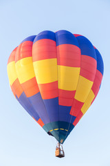 Naklejka premium Colorful hot air balloon with blue sky background