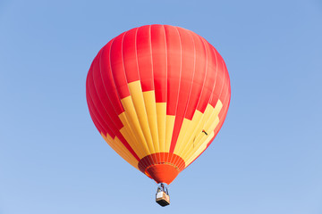 Fototapeta premium Colorful hot air balloon on blue sky background