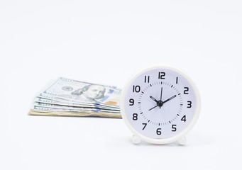 Dollar banknote and clock