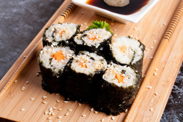sushi on a wooden desk