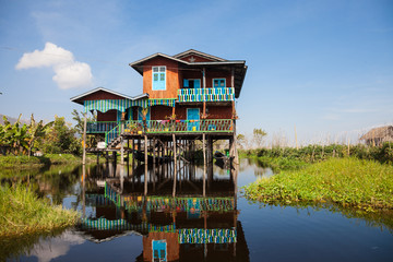 House and floating gardens at one of Inle Lake villages on the water in Myanmar.