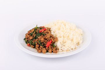 Rice topped with stir-fried pork and basil, fried stir basil with  minced pork on white background (isolated background)