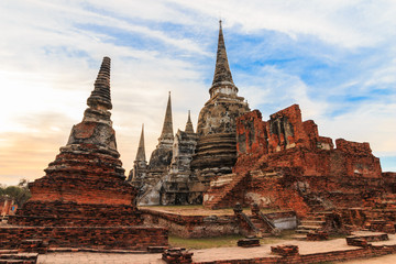 Fototapeta premium Asian religious architecture. Ancient Buddhist pagoda ruins at Wat Phra Sri Sanphet Temple in Ayutthaya, Thailand 