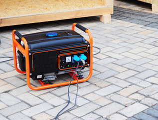 Mobile Gasoline Generator on the Building Site