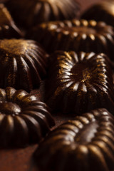 chocolate sweets with edible golden powdeer