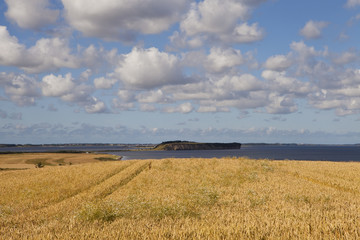 The Island of Mors, Looking North. The island of Mors lies in the middle of the Limfjord, a still body of water that cuts through the mainland of Denmark. The island is a peaceful rural backwater. © janecampbell21