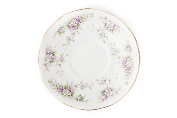 Old porcelain plate on the white background