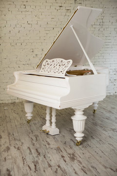 White piano in a White modern Interior. White Sitting Room.