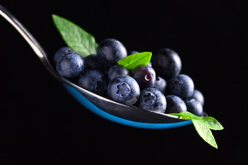 blueberry on  black background