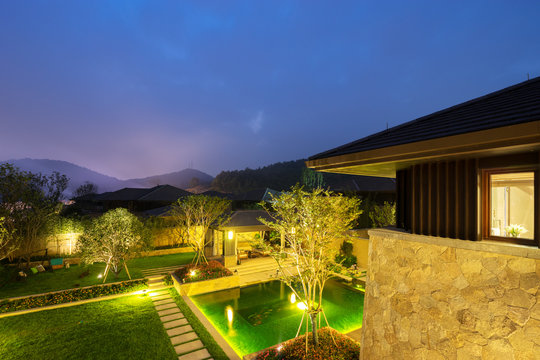 Backyard In Modern Villa In Clear Sky At Night