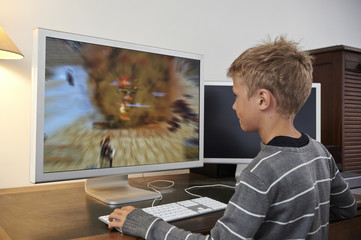 child playing online games in computer