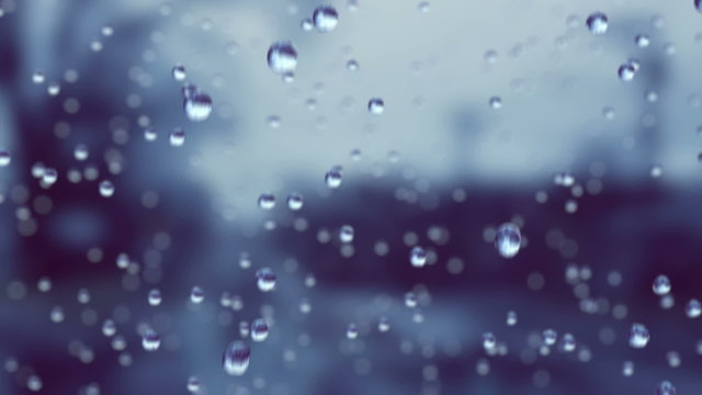 Beautiful Rain Drops in Slow Motion Falling. Loop. HD 1080.