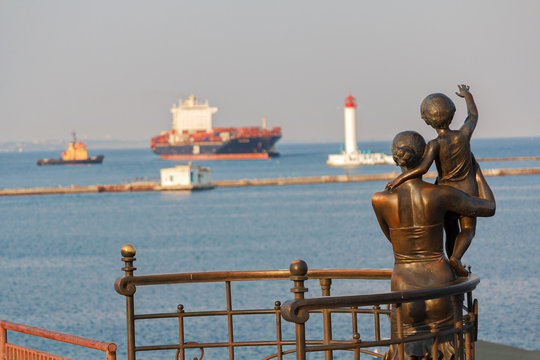 Statue of mother and son greeting the sailor on the pier. Odessa, Ukraine