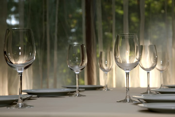 empty glasses at the table setting in the cafe