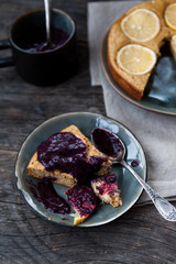 Lemon tart with blueberry sauce