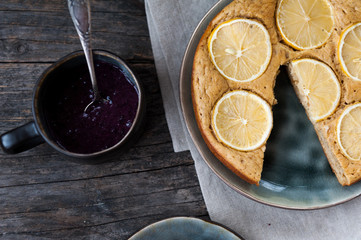 Lemon tart with blueberry sauce