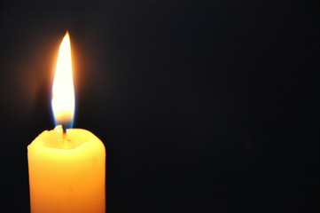 Burning Candle in the dark