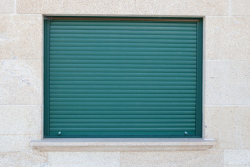 Green closed metal shutter