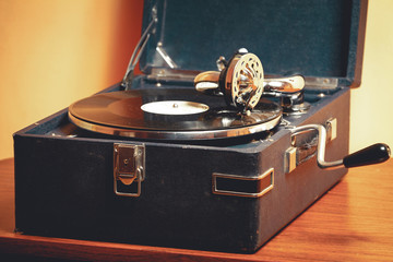 Old record player gramophone needle on record closeup. vintage toning © perfectlab