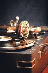 Old record player gramophone needle on record closeup. vintage toning © perfectlab