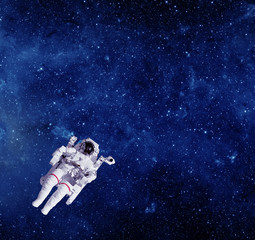Astronaut in outer space. Elements of this image furnished by NA